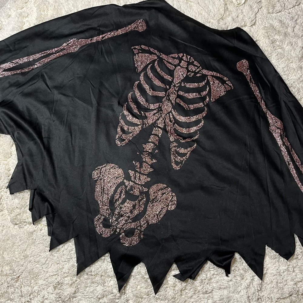 Rose gold skeleton poncho